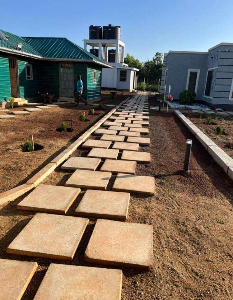 Stepping-stone walkway between guest cottages